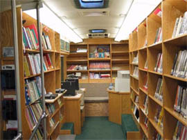 books and computers in bookmobile